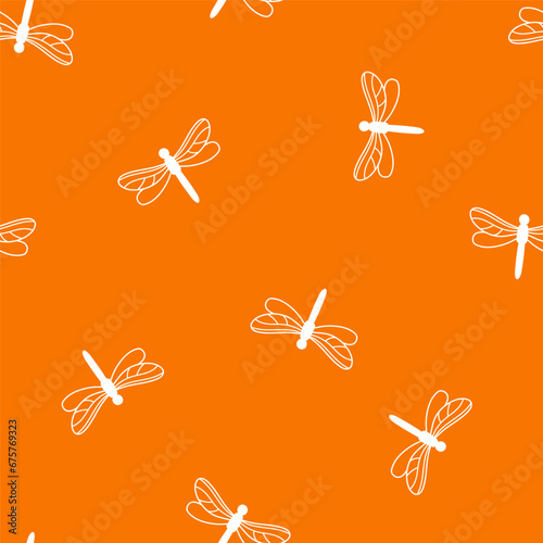 Orange seamless pattern with white dragonflies