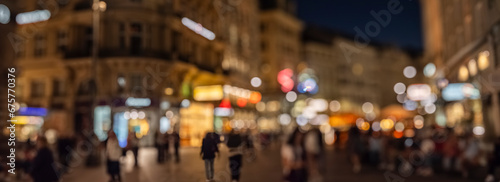 Crowd of anonymous people walking on busy city street at night , urban city life background