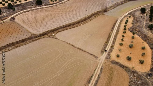 Mosaic of crops, wine and river. Drone footage in Castilla la Mancha, land of don quijote, vineyards, flat land, cereals, dirt tracks and paths. Horcajo de Santiago in 4K with DJI Mini 2 photo