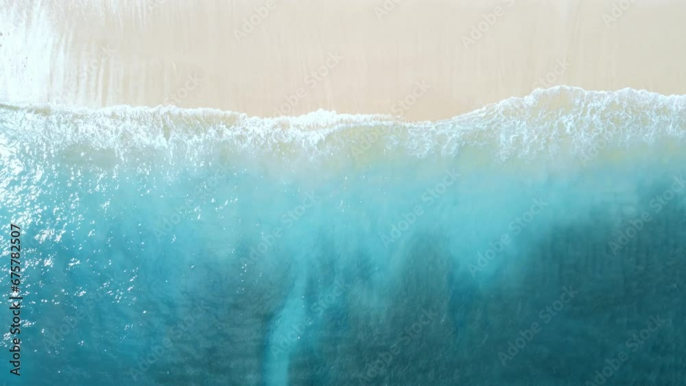 Beach with blue ocean in sunny day. Aerial view. Top view