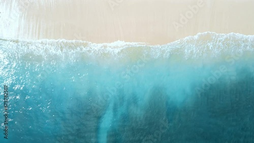Beach with blue ocean in sunny day. Aerial view. Top view
