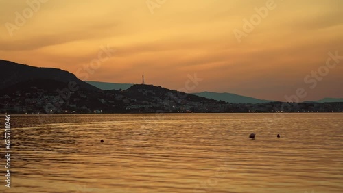 Summer sunset in the city of Porto Rafti in Greece. photo