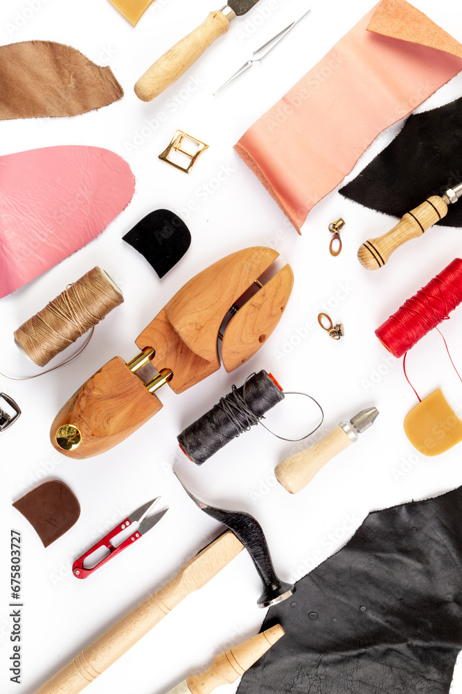 Tools for leather goods, handbag or shoe manufacturing industry, flat lay Tools for leather goods, handbag or shoe manufacturing industry, flat lay