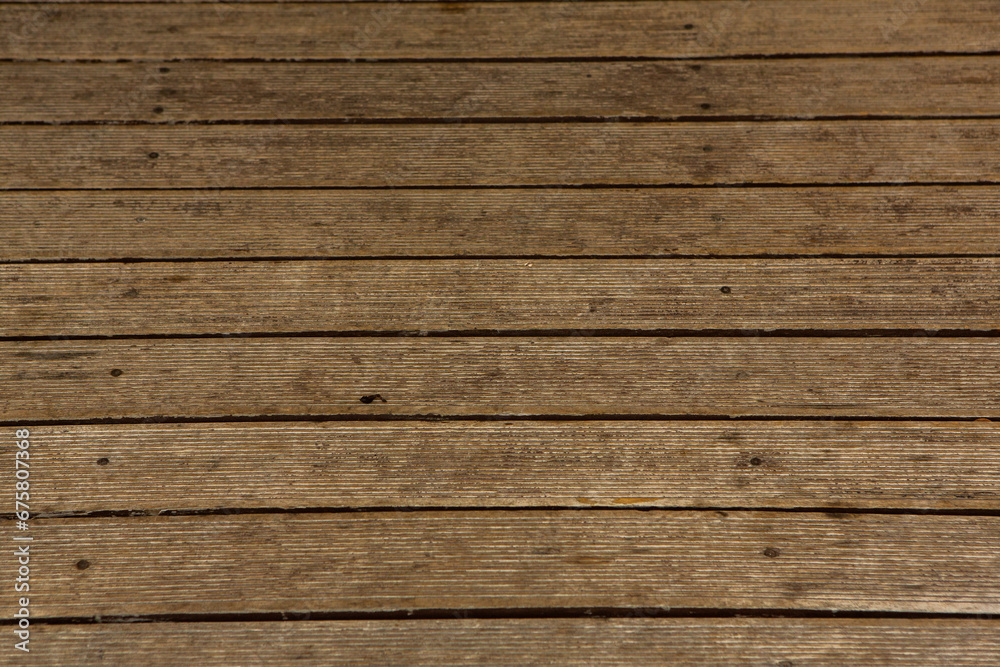 Fototapeta premium Old wood texture background, surface with old natural colored wood, top view. Grain table surface.