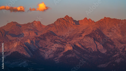 The Sierra Nevada mountains illuminated by a strong sunset light.
