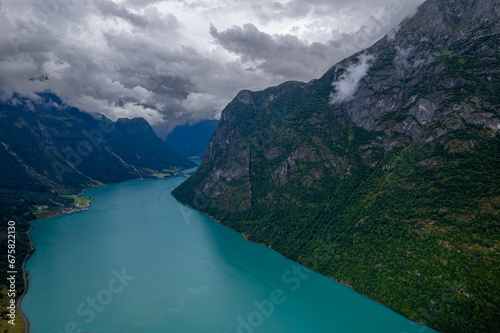 Fototapeta Naklejka Na Ścianę i Meble -  Aerial view above the mountains, fjords and lakes of Norway during summer 