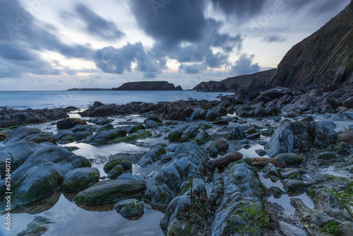 Wallpaper Mural Marloes Sands, Pembrokeshire, Wales at dusk with cloud and looking moody at high tide Torontodigital.ca