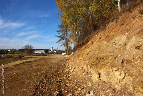 Geological outcrop of limestone and marl from the Lower Carboniferous period. Kaluga region, Russia photo