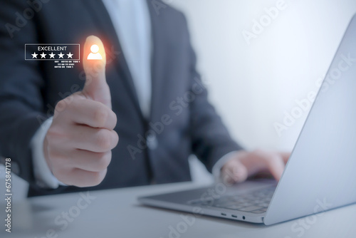 business man giving thumbs up for react other for doing a good work , working well , successful 