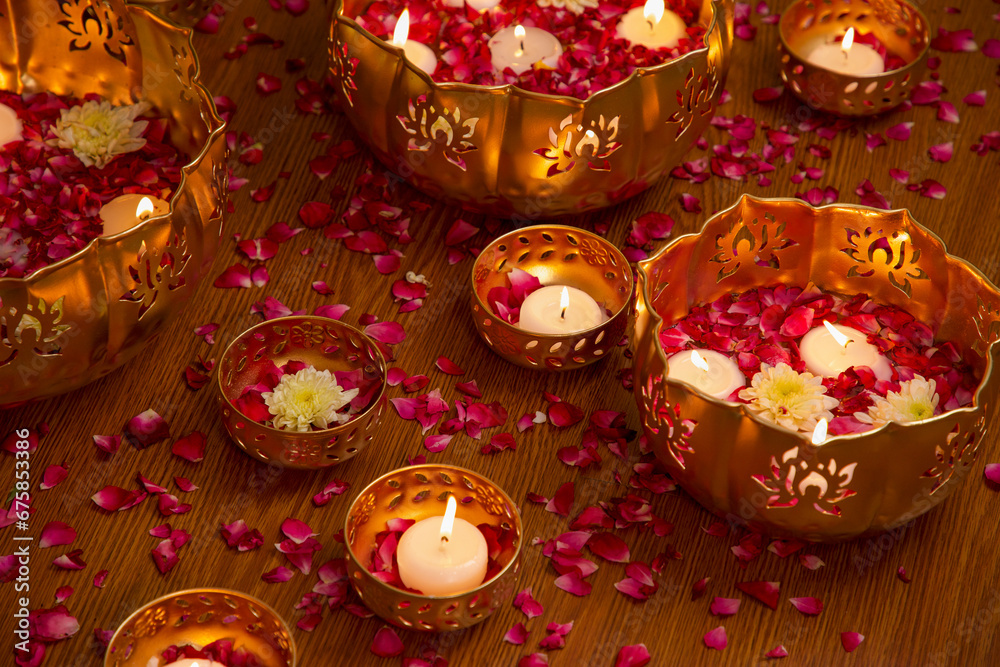 Flowers, candles, decoration. Diwali background.