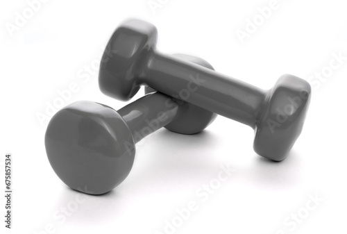 A pair of hand Home dumbbells close up shot. Isolated on white, clipping path with shadows