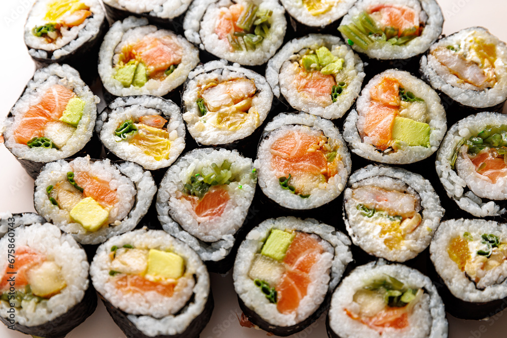 Top view of various sushi rolls. Top view of various sushi rolls.