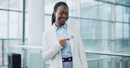 Woman, portrait and badge for vote, smile and confidence or button, proud and choice in politics. Black person, happy and support for elections, democracy and party in registration for human rights