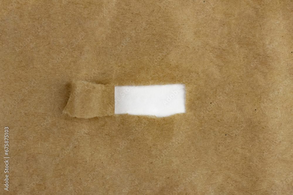 Frame in craft paper. Craft and white paper background Frame in craft paper. Craft and white paper background