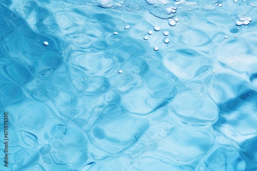Transparent blue surface of clean water with ripples