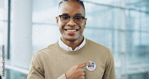 Man, vote and portrait for election, pointing and badge for support, government and politics. Democracy, voter choice and representative for party, registration and sticker for voting register