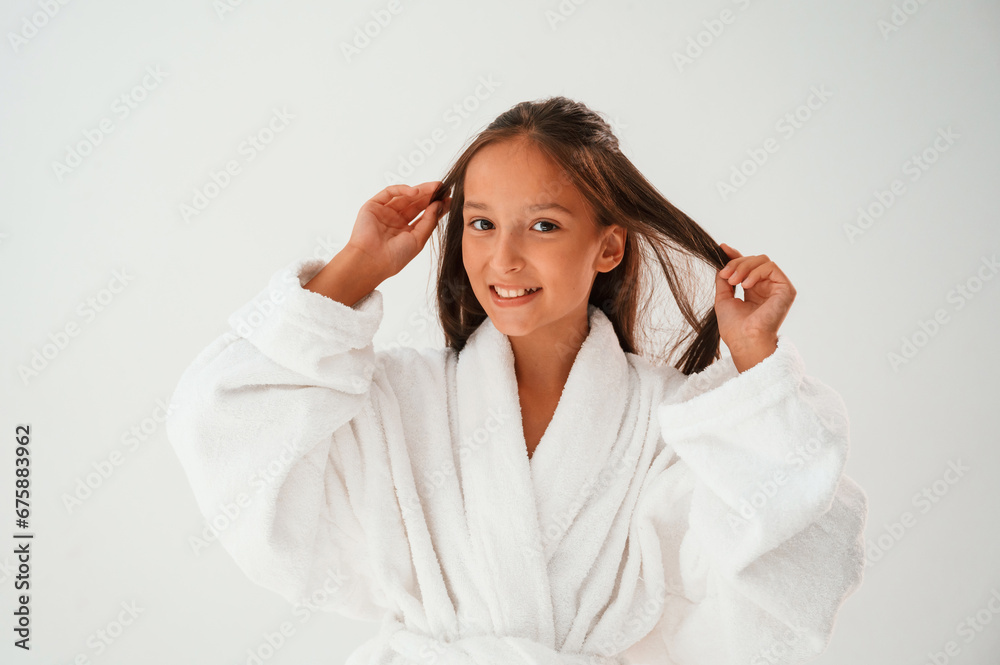 Cheerful, with eye patches. Conception of beauty and self care. Young girl is in the studio Cheerful, with eye patches. Conception of beauty and self care. Young girl is in the studio