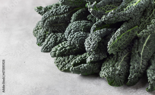 Black tuscan kale (cavolo nero or lachinato kale), close up, copy space photo