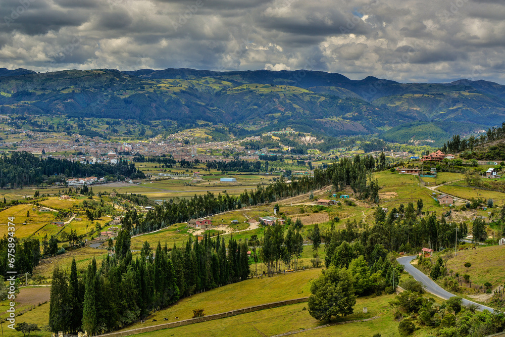 Colombian town of Paipa in Boyaca region, travel destination, natural light background copy space image, mountain range small town