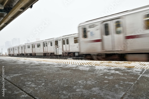 NYC subway public transportation copy space background image, snow storm, bad weather theme photo