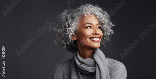 Happy Mature Black Woman in Gray Studio Background – Beauty Ad
