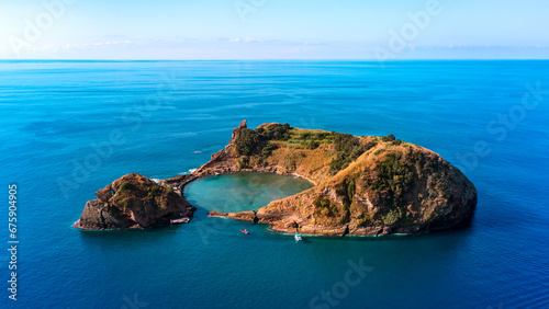 Drone shot of the small island of Ilhéu de Vila Franca do Campo on the Portuguese island of São Miguel in the Azores photo