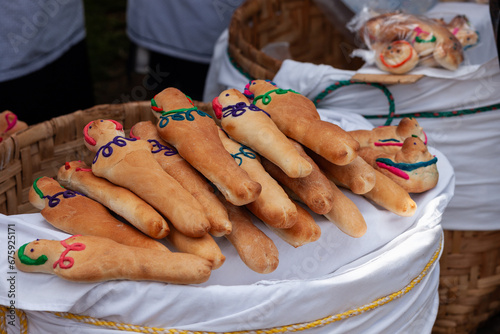 Group of bread dolls decorated with colorful colors to visit the deceased on Saints  Day in Otavalo Ecuador