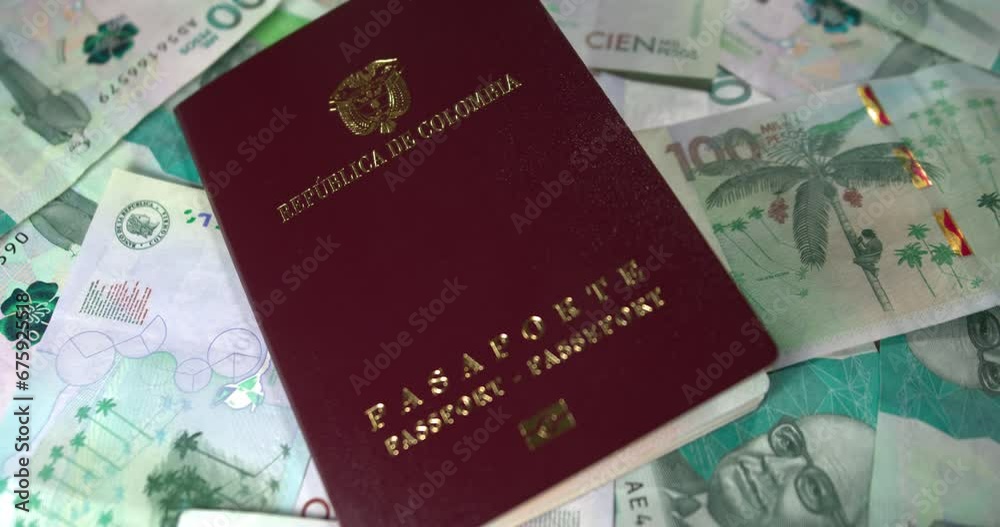 Colombian passport on Colombian money COP 4K Colombian passport on Colombian money COP 4K