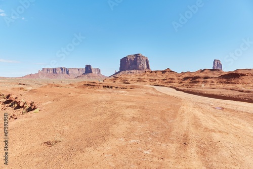 The iconic Mittens formations, as seen on the Monument Valley Scenic Drive