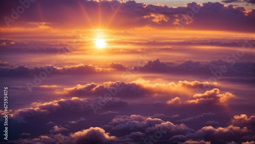 Beautiful Aerial Sunset Landscape with Sun and Clouds in Purple-Orange Tones