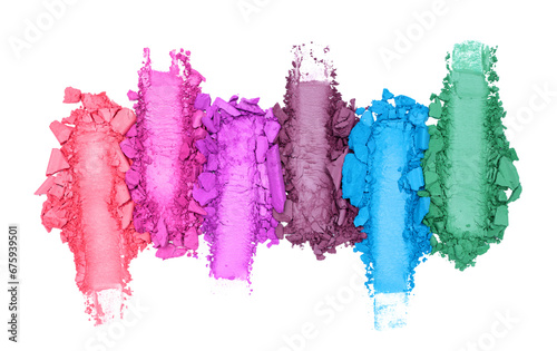 Broken and smashed color make-up eyeshadow palette, lay of brush strokes, on transparent background, top view. Sample cosmetics concept photo