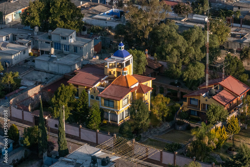 Mexico, aerial view on houses in town next to Theotihuan City of Gods