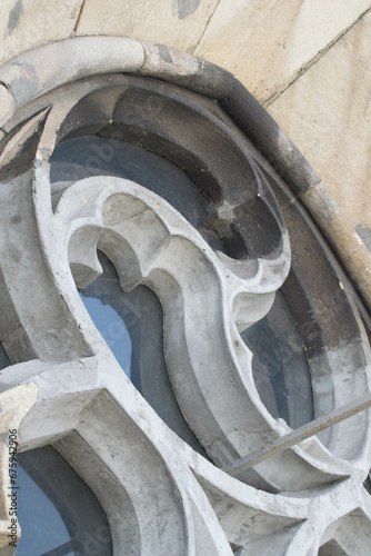 Triskelion on a stained glass window of a Christian church