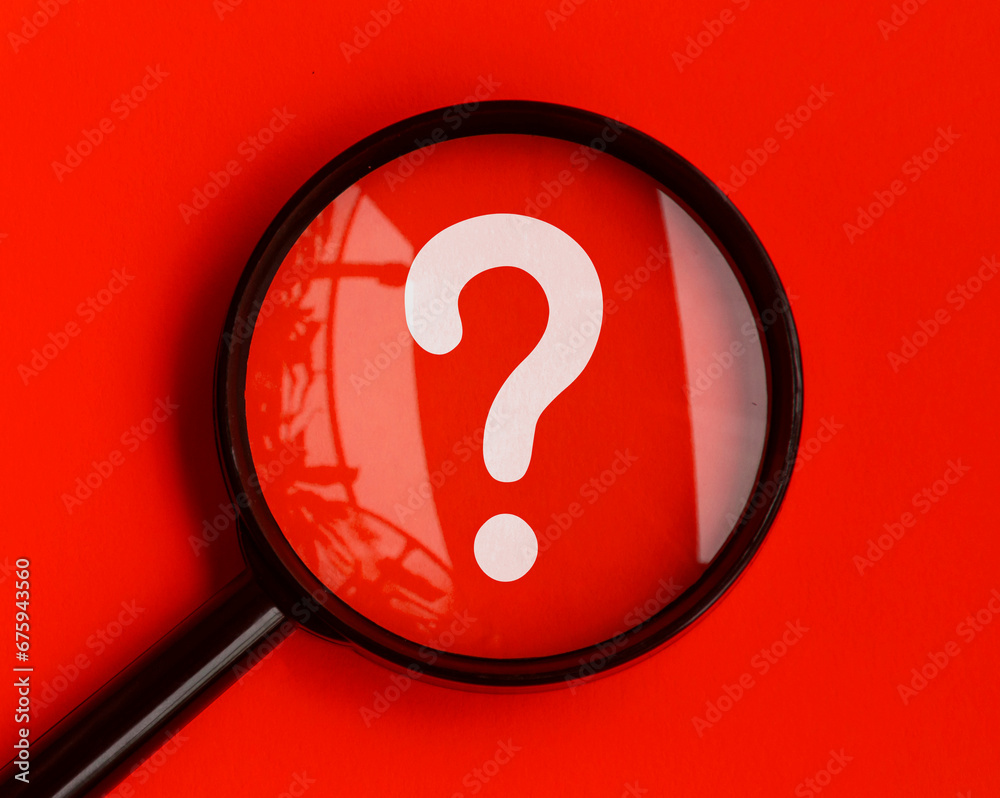 Question mark on red background with magnifying glass. Question and Answer session. Question mark on red background with magnifying glass. Question and Answer session.