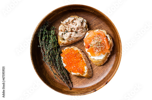 Bruschetta with Hot Smoked salmon, red caviar and herbs. Transparent background. Isolated