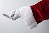 Santa Claus hand rudely showing the middle finger wearing gloves