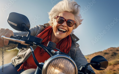 An elderly woman with a joyful look speeds by on her motorbike © Giordano Aita