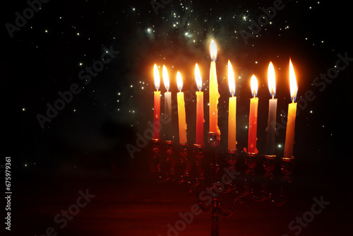 Religion image of jewish holiday Hanukkah background with menorah (traditional candelabra) and candles photo