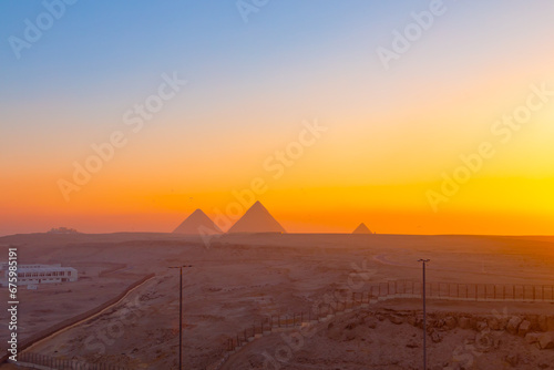 The Great Pyramids of Egypt at dawn.