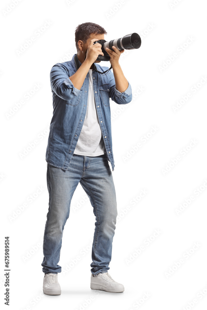 Full length shot of a man taking a photo with a professional camera