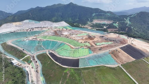 Hong Kong North East New Territories Landfill disposes of industrial, commercial and residential waste, the gases and leachate sewage discharged can be collected and treated for environmental protecti photo