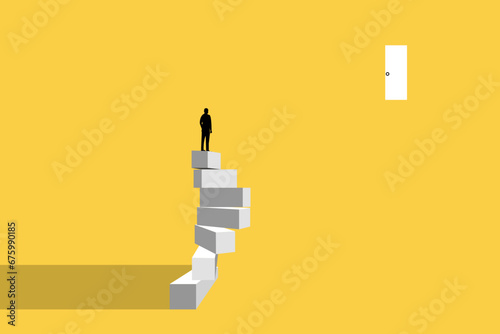 Businessman standing at the top of block. concept of Business success, leadership, achievement and goal