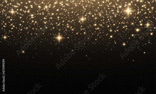 Glittering effect of particles. The dust sparks and golden stars shine with special light.