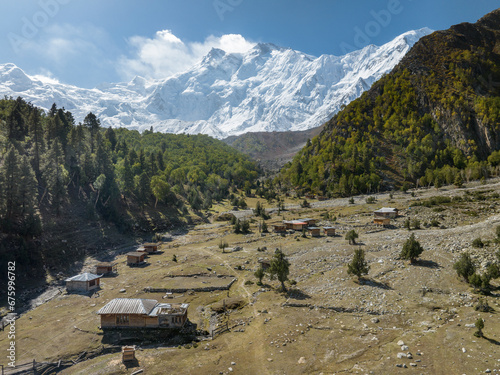 Native village at the trail of Nanga Parbat, a small settlement with several houses, in Northern Pakistan