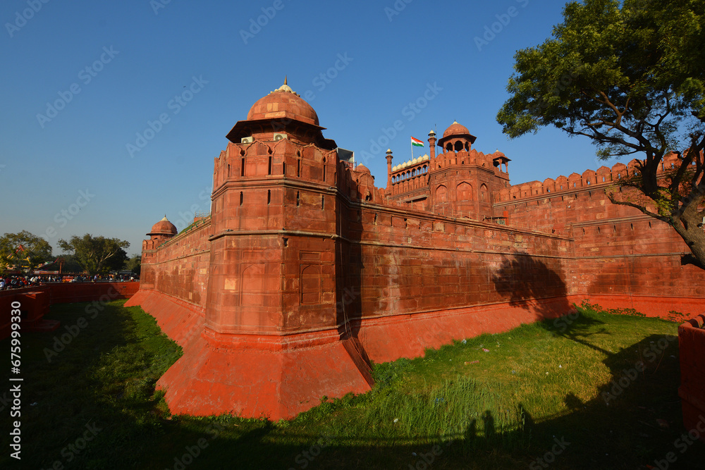 Red fort is a historic fort in the Old Delhi neighbourhood of Delhi, India, that historically served as the main residence of the Mughal emperors. Emperor Shah Jahan  - obrazy, fototapety, plakaty 