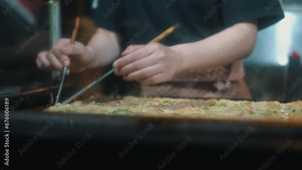Chef Preparing Takoyaki at a Street Food Stall Chef Preparing Takoyaki at a Street Food Stall
