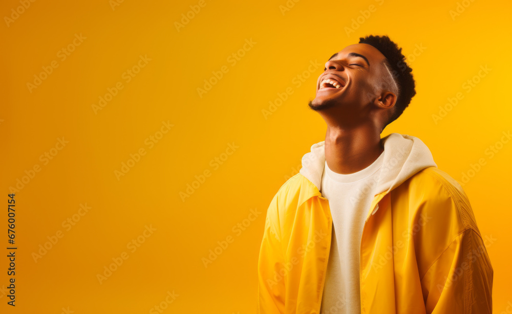 Ultra handsome man, model, smiling and laughing, wearing bright clothes. Bright solid green, blue and yellow isolated background. Ultra handsome man, model, smiling and laughing, wearing bright clothes. Bright solid green, blue and yellow isolated background.