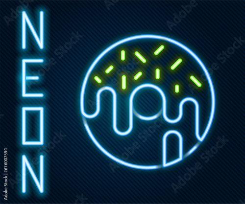 Glowing neon line Donut with sweet glaze icon isolated on black background. Colorful outline concept. Vector