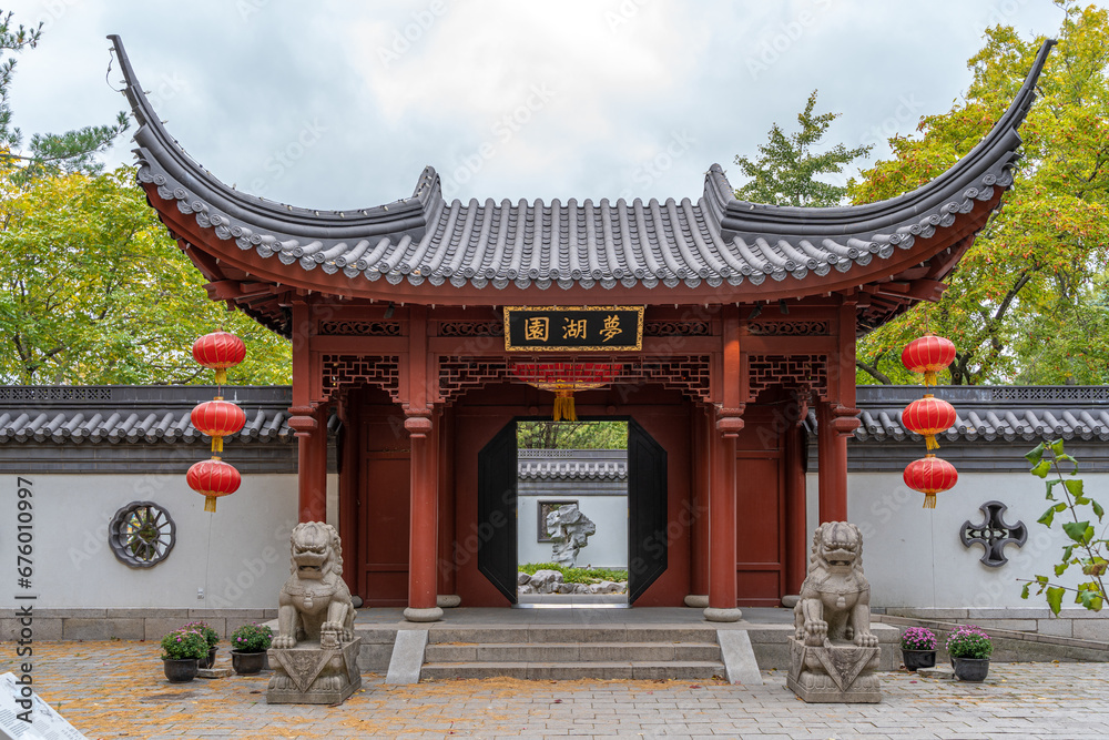 Chinese Temple gate. Entrance to the chinese gardens of in the Montreal Botanical gardens. Calm Zen serene place. Chinese Temple gate. Entrance to the chinese gardens of in the Montreal Botanical gardens. Calm Zen serene place.