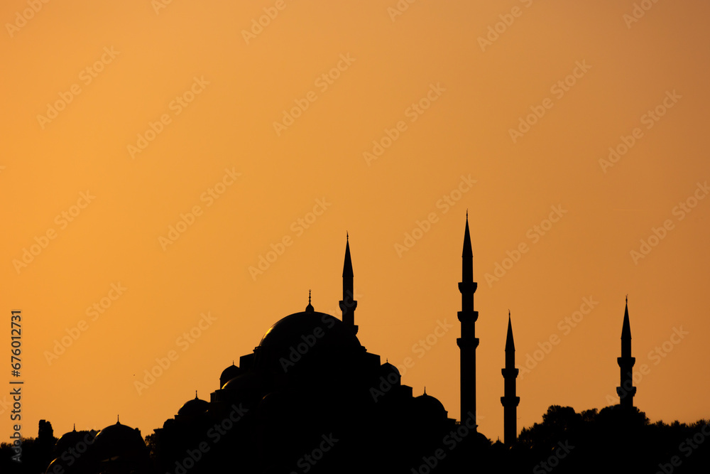 Silhouette of Suleymaniye Mosque at sunset. Ramadan or islamic concept photo